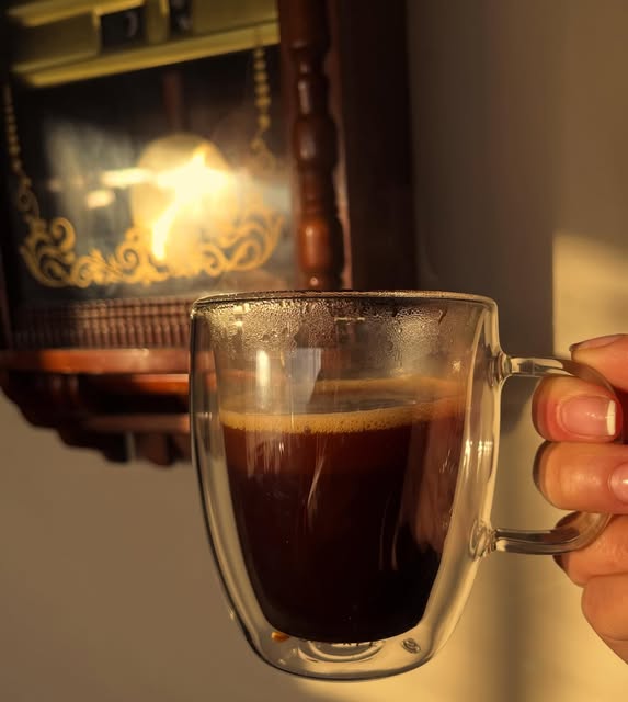 Fresh coffee in a glass cup